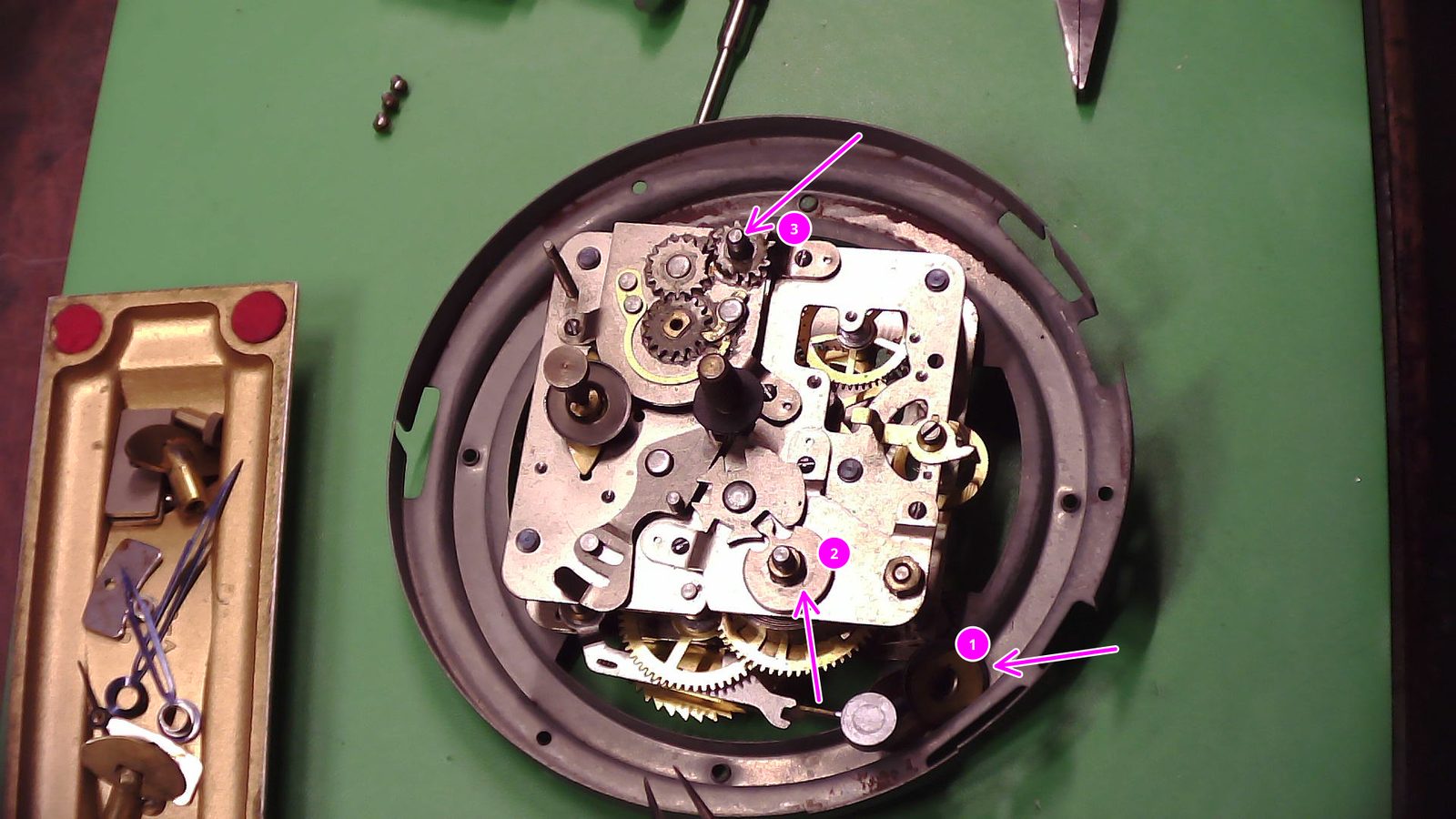 Washer Position Reference — So on this one there are washers at position one that go over the winding arbors of two and three.  The larger holed metal washers go over the alarm setter and winder.  The smaller hole with no brass "eye" washer goes over winding.